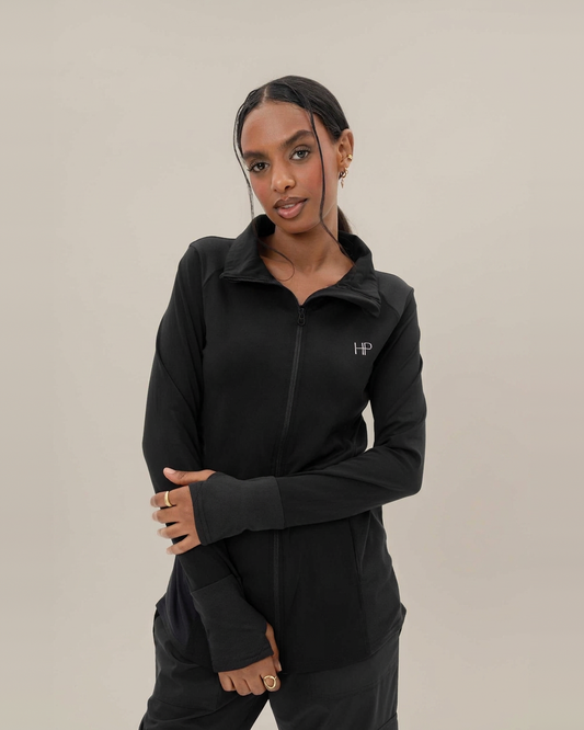 Black – Nedia hip-covering zip sports jacket, angled front view