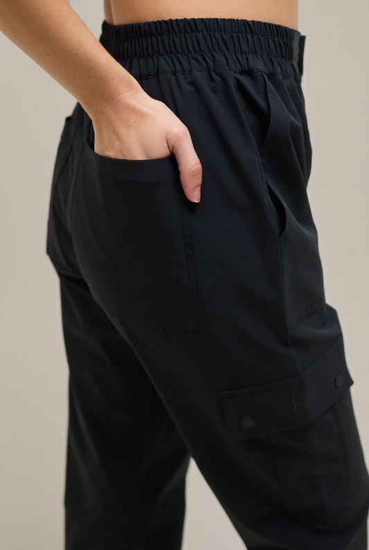 Black - Saida waistband detail with plain warm-greige background