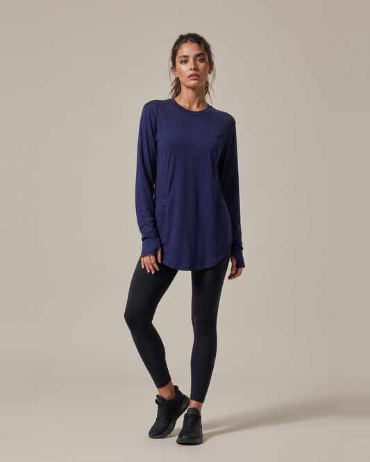 Navy – Jenna long sleeve athletic top with double pockets, full-length front view