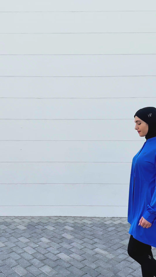 Gym outfits for the week with a sport hijab: blue zip top, black long top, white top and navy abaya