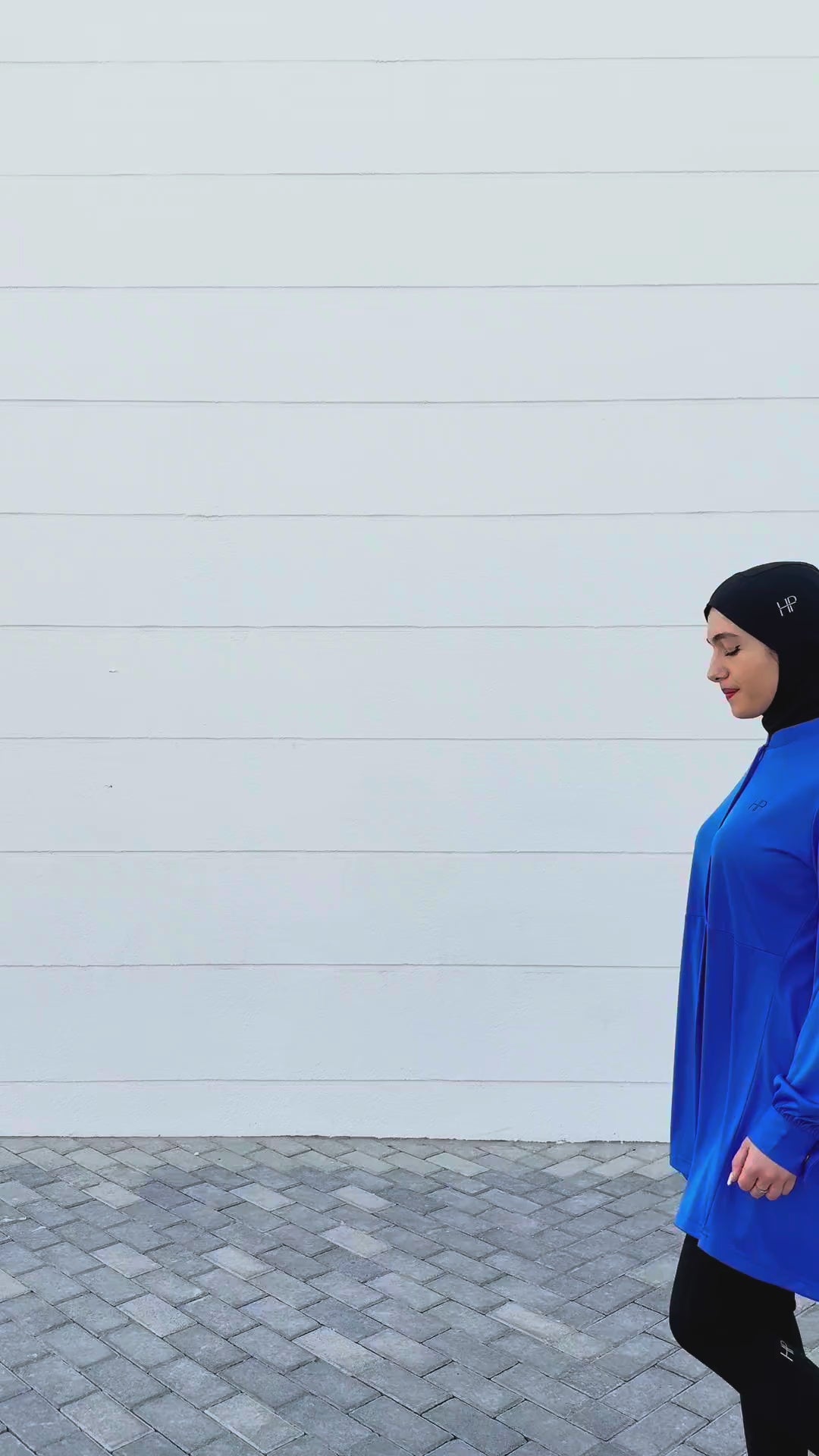 Gym outfits for the week with a sport hijab: blue zip top, black long top, white top and navy abaya