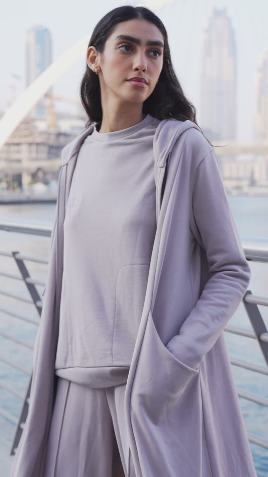 Close-up of the Rahma long French terry hooded jacket in lilac
