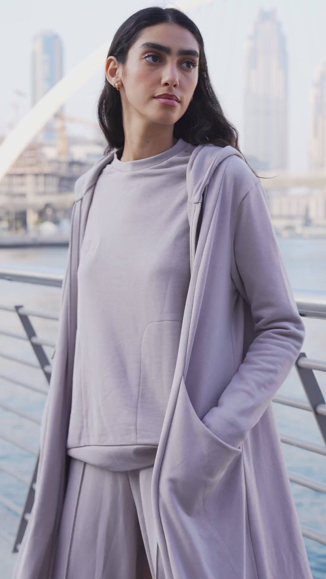 Close-up of the Rahma long French terry hooded jacket in lilac