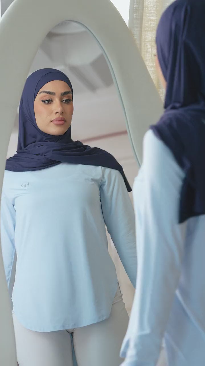 Video: Alina sport hijab in navy with a light blue long top