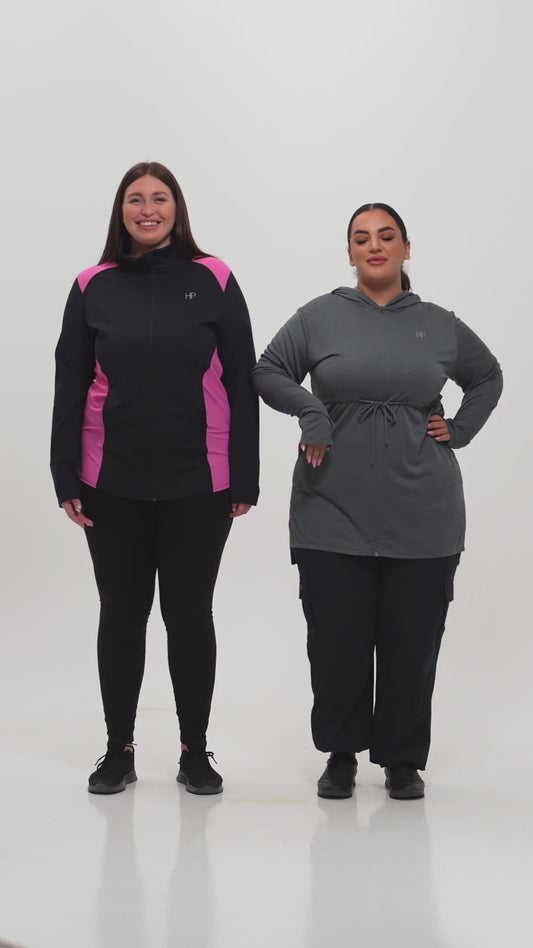 Two plus-size models in burgundy and red long modest tops